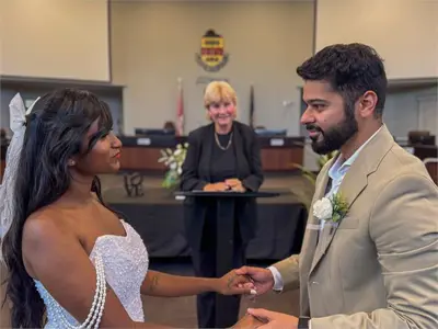 Couple with officiant