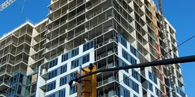 exterior view of apartment building under construction