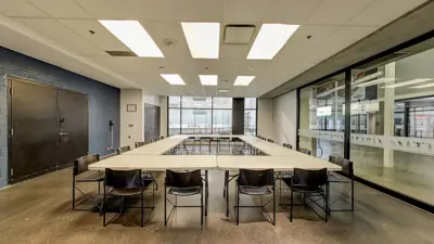 Delpark Home Centre Activity Room set up with tables and chairs