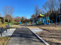 Greenbriar Park pathway and playground.