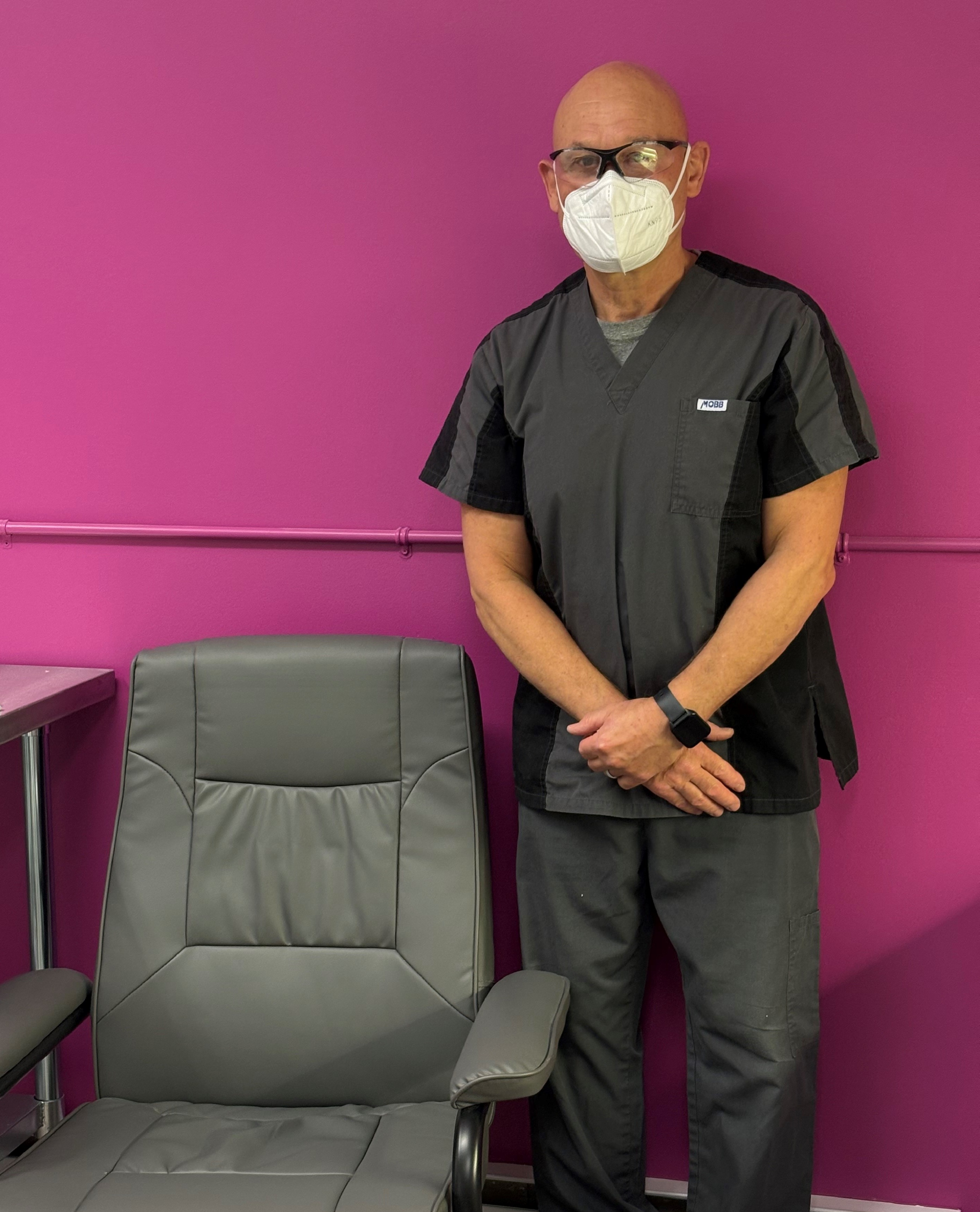 Foot Care nurse Al standing in footcare room at John Street